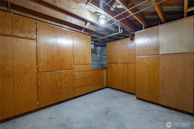One of the rooms in basement with many cabinets!