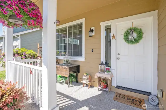 The covered front porch offers the perfect spot to sit back and relax.