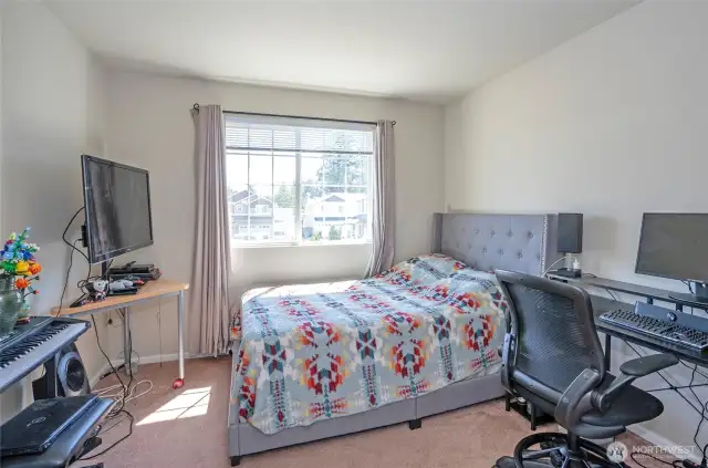 Enjoy the added comfort of Guest Suite #2, where natural light fills the space with warmth.