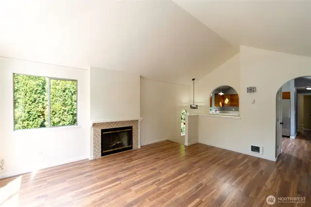 New tile around fireplace, vaulted ceilings, new wall heaters. All new LVP flooring throughout the home!