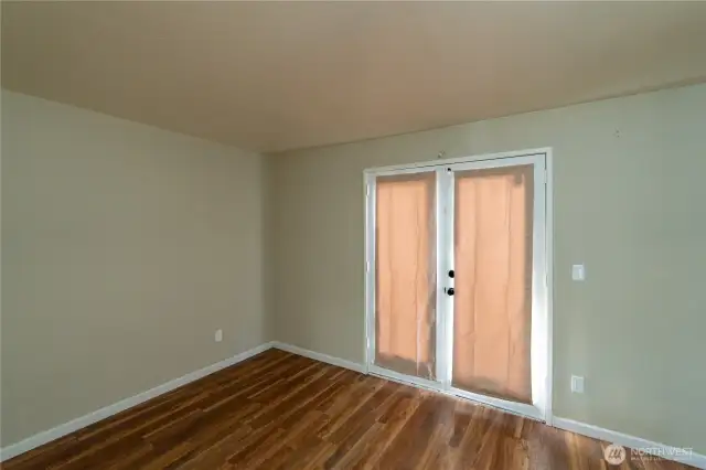 Lower bedroom with French doors.`