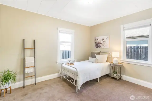 Big bedroom with room for dresser.