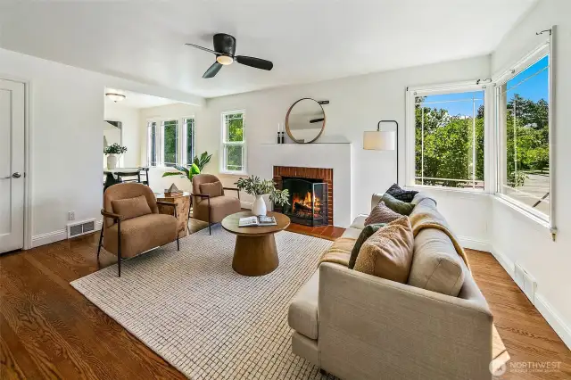 Welcome to a sun kissed and bright large living room.