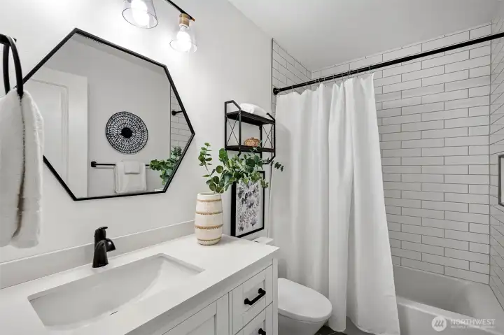Full bathroom upstairs. Updated in 2023.