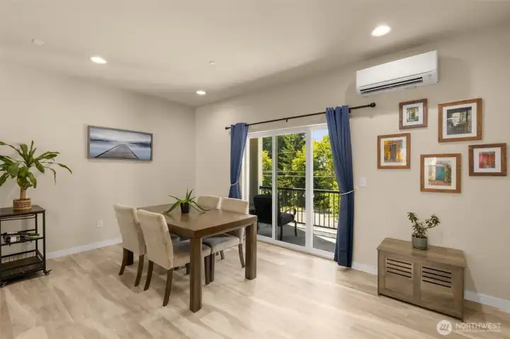 Dining room sits just off the kitchen, perfectly placed for easy meals and effortless entertaining, with seamless access to the patio for indoor-outdoor gatherings.