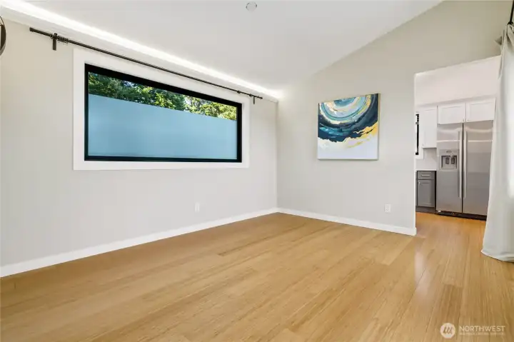 Open Family room w/led lighting accents. Bamboo floors throughout
