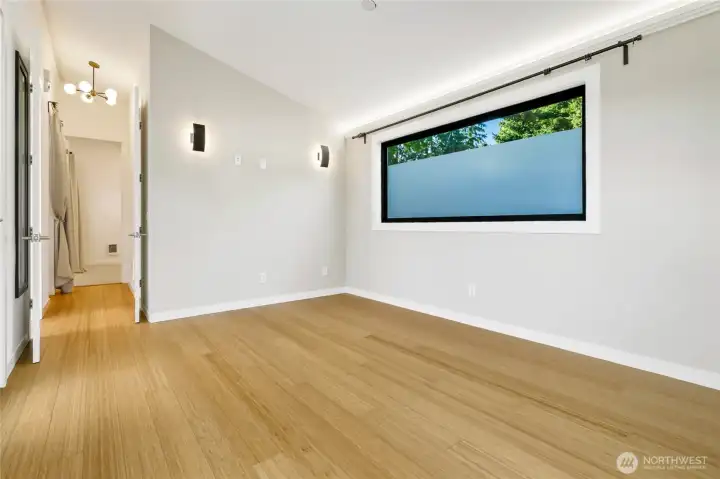 indirect wall lighting to warm the room. Vaulted ceiling make the room live large