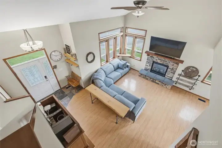 Birds eye view of the entry and living room from the upstairs level