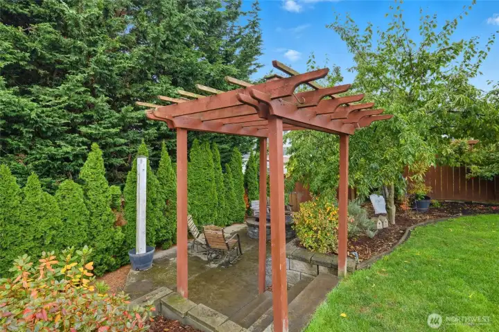 Nice pergola leads to the outdoor firepit