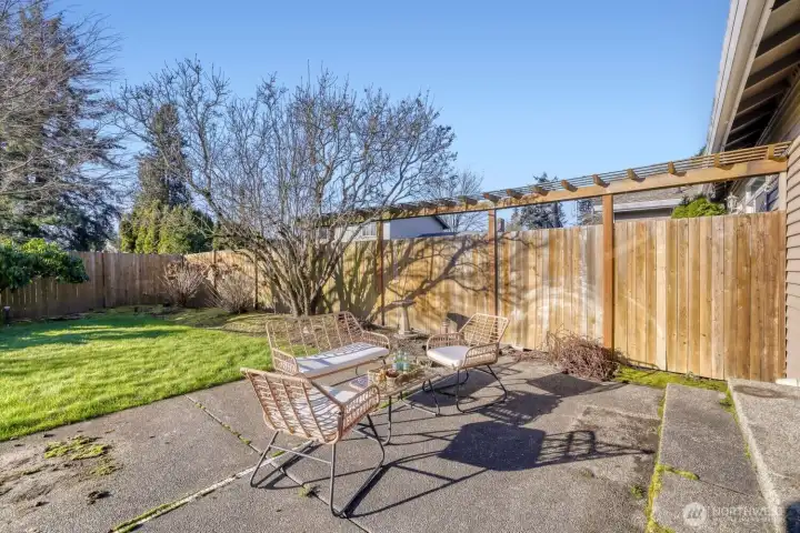 Fully fenced backyard with patio - landscaping is included with HOA!