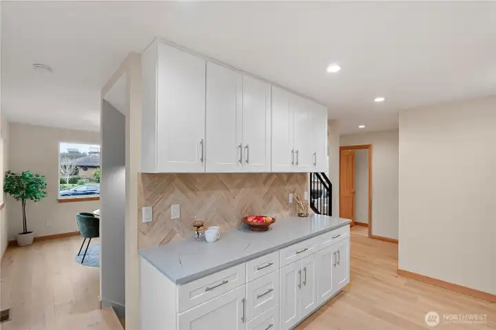 Easy flow from dining, to kitchen, to living.