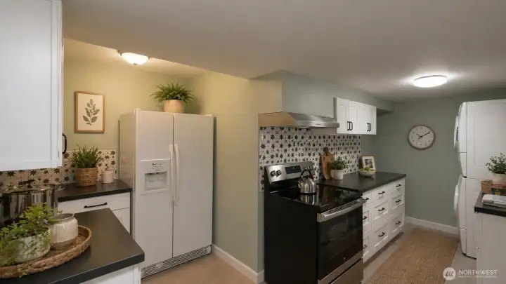 daylight basement with separate entrance and second kitchen for multi-generational living or guest use. Built in 1997 and updated through 2025, the layout includes a flex room, three fireplaces
