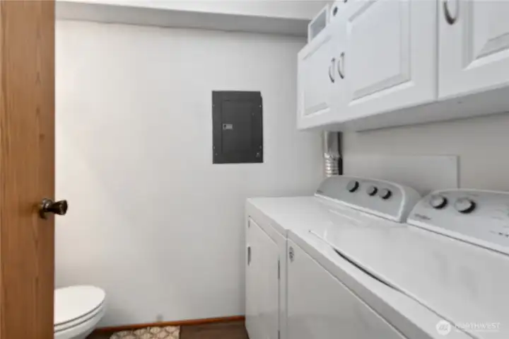 Downstairs half bath w/ laundry (hookup provided, tenants provide own W/D)