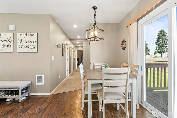 View from the kitchen, through the dining room at the bedroom hallway.