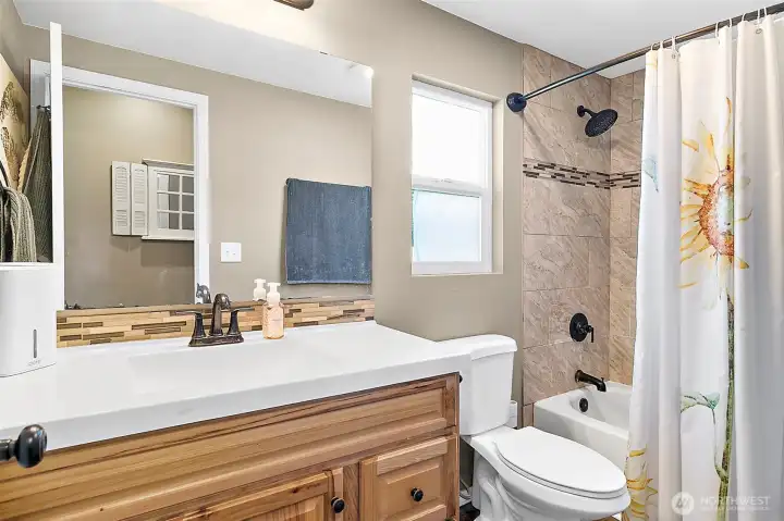 Beautiful tile work around the shower.