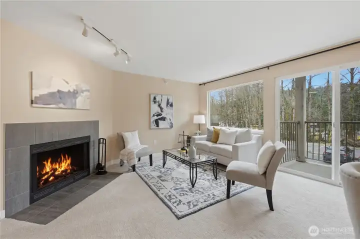 Living room with wood burning fireplace. Living room with wood burning fireplace.