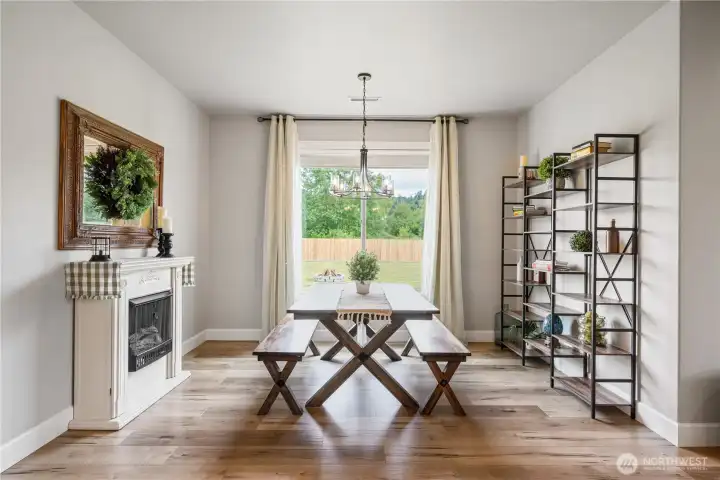 Large dining area with view to back yard