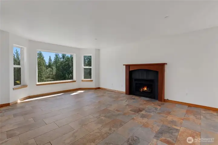 Living room with gas fireplace.
