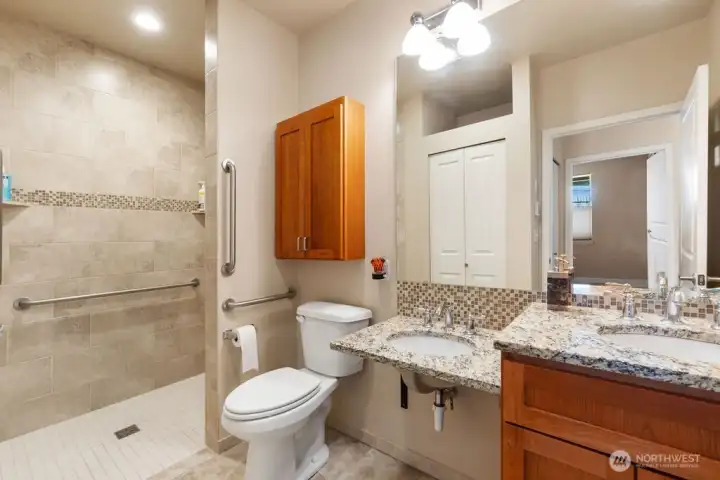 ACCESSIBLE BATHROOM SHOWER WITH HEATED FLOORS ACCESSIBLE BATHROOM SHOWER WITH HEATED FLOORS