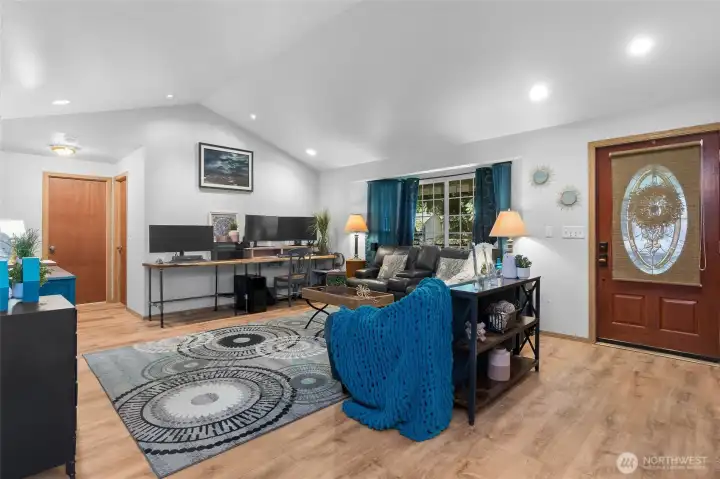 Looking into living room and front door