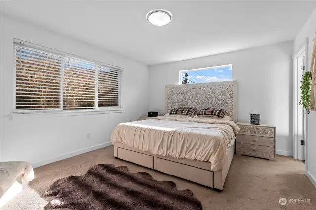 Primary bedroom suite with private bath.