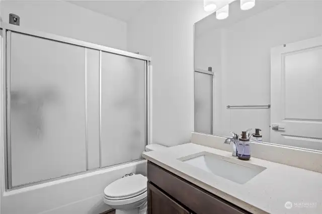 Main floor bath with a tub/shower combo.