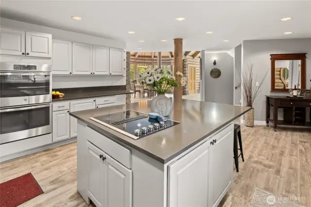 Newer quartz countertops and stainless appliances.