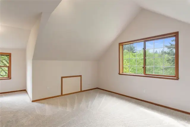 3rd bedroom. North side of home overlooking forest.  Shared bathroom with 2nd bedroom.