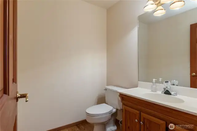 Half bath on main level.  Bath is outside of living room in entry.