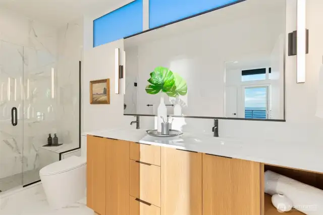Primary Bath features dual sink vanity with oodles of storage.  Photos are staged model of same floorplan.  Color schemes may vary.