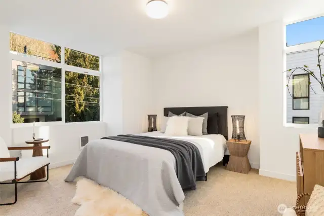 One of two second level bedrooms.  Photos are staged model of same floorplan.  Color schemes may vary.