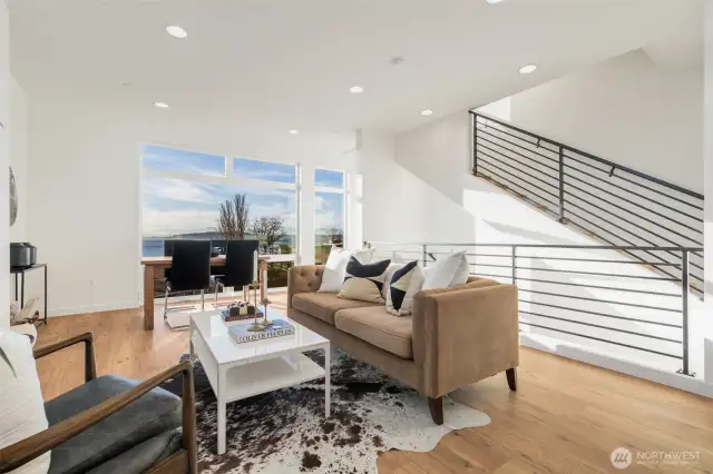 Third level great room.  Extraordinary views are your backdrop!  Photos are staged model of same floorplan.  Color schemes may vary.