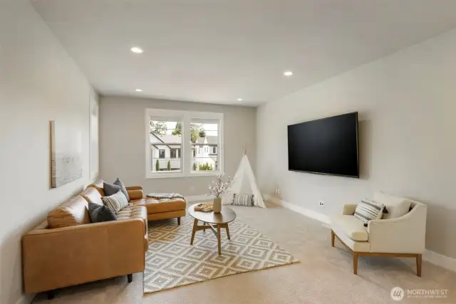 Located at the top of the stairs, this spacious bonus room is perfect as a media lounge, playroom, or flex space to fit your lifestyle. With plush carpeting, ample natural light, and room to spread out, it’s a comfortable and versatile retreat for the whole household.