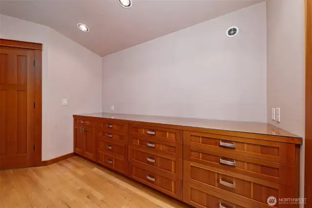 Big built-in dresser in primary bedroom. Dove tailed drawers are classically beautiful!