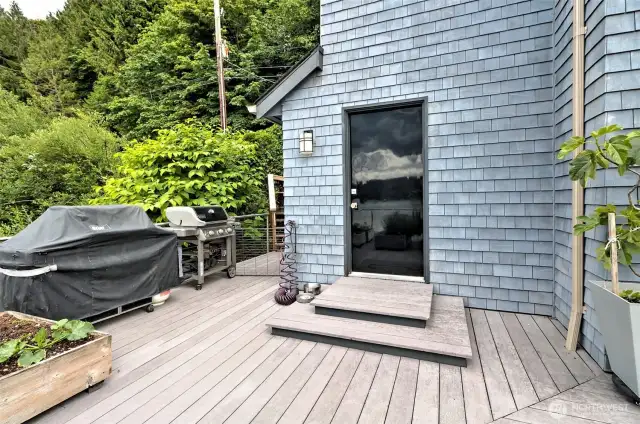 This door leads to a small but convenient workshop righ off the deck.