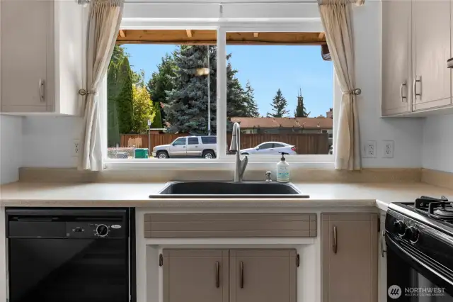 Open Kitchen with big bay window