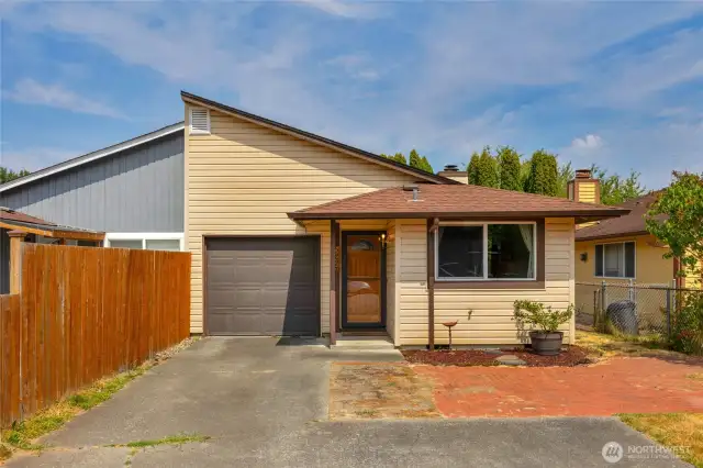 Single story home in Marysville Washington with parking for 3+ vehicles and a fenced backyard