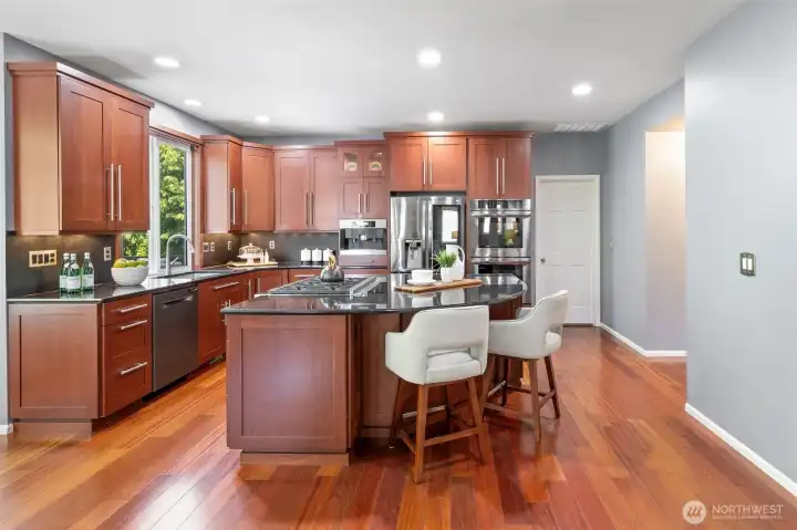 Remodeled kitchen with huge center island.