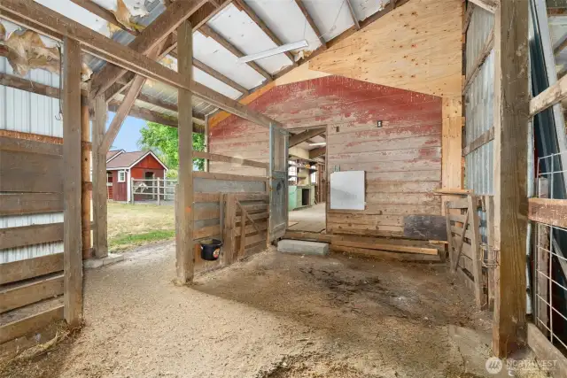 Through the workshop access to covered stalls. Barn/Hay access to the right.