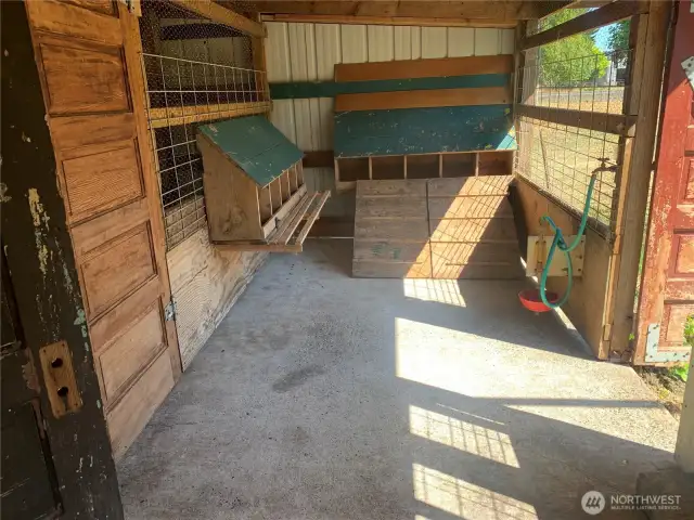 Tidy chicken coop off of the back of the additional finished space.