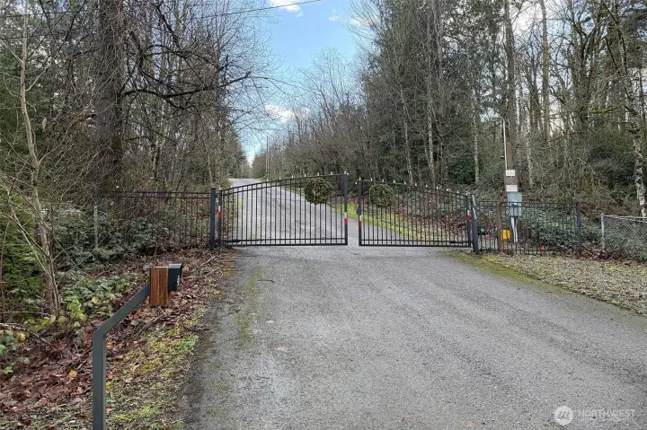 An automated gate welcomes you home to this private 5 lot community. The subject property begins on the right side just after the gate and extends to first cross street.
