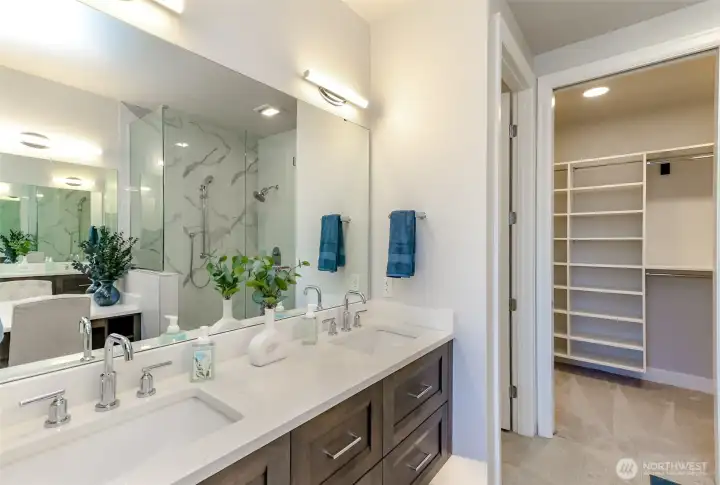 Double sinks with under cabinet lighting and Heated Flooring