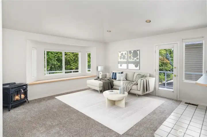 Hearth room connected to kitchen. virtually staged