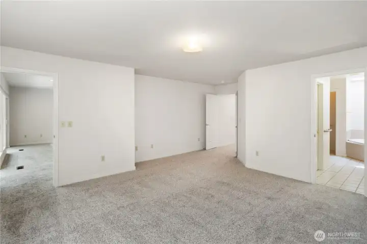 Primary has door on left to sunroom, door in middle to hall and door on right to primary bath