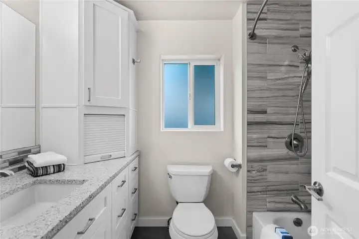 Primary bath is full of storage space!