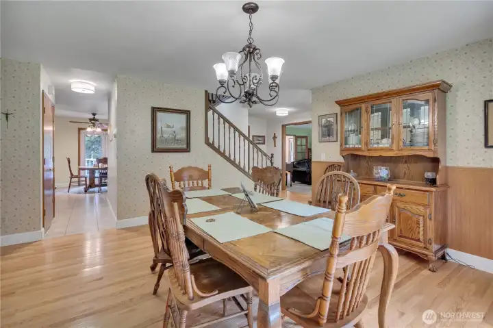 Another perspective of the dining area, featuring seamless access to the kitchen for easy entertaining.
