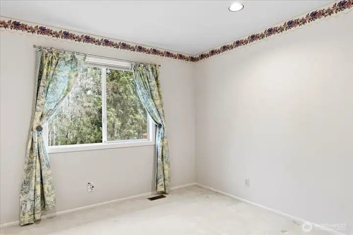 Bedroom #3 (located back of house w/ backyard view)