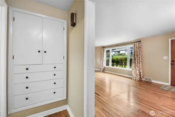 Built-In Cabinetry & Drawers in hallway between Living Room & Kitchen