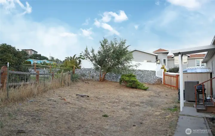 Fully fenced back yard.