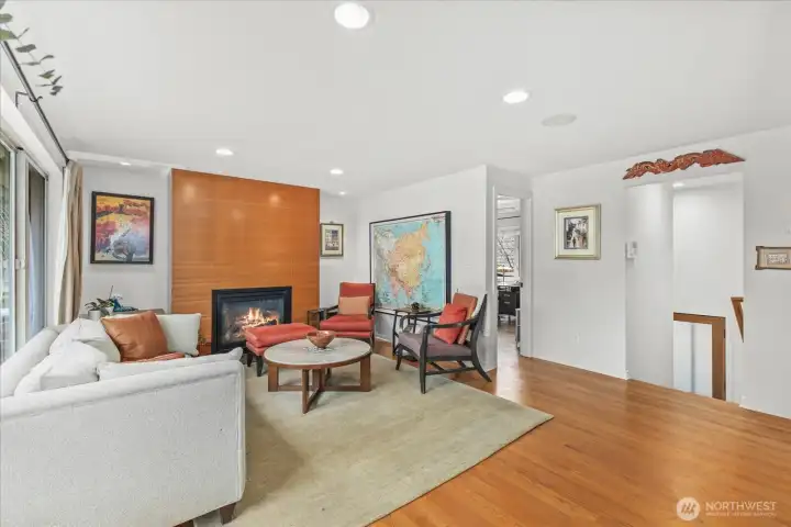 Living room looking south.  Staircase leads to the spacious patio, mid-way between formal rooms and private primary.